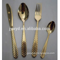 full gold spoon fork and knife